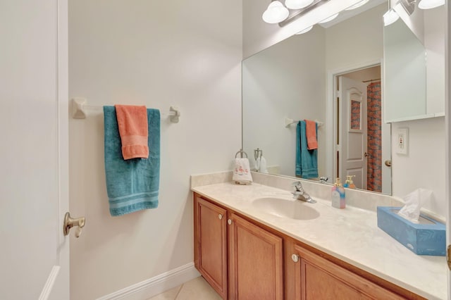 8353 Grand Messina Cir, Boynton Beach, FL 33472 - bathroom featuring tile patterned flooring, vanity, and baseboards