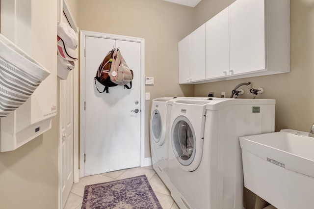 8353 Grand Messina Cir, Boynton Beach, FL 33472 - clothes washing area featuring light tile patterned flooring, separate washer and dryer, a sink, and cabinet space