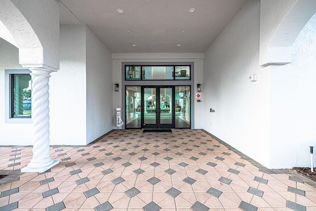 8353 Grand Messina Cir, Boynton Beach, FL 33472 - doorway to property with french doors and stucco siding