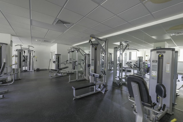 workout area with a drop ceiling