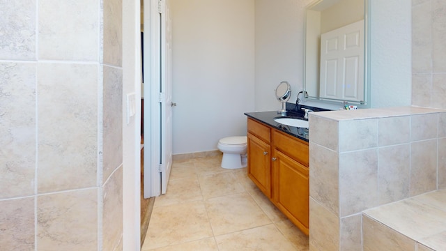 1942 NE 6th St, Deerfield Beach, FL 33441 - full bathroom with toilet, tile patterned flooring, and vanity