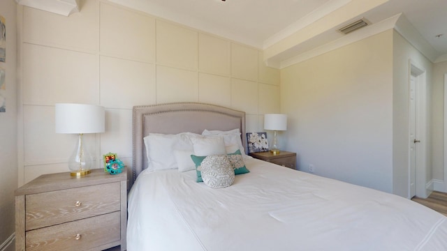 1942 NE 6th St, Deerfield Beach, FL 33441 - bedroom with visible vents and crown molding