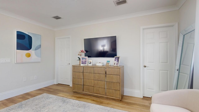 1942 NE 6th St, Deerfield Beach, FL 33441 - bedroom with baseboards, wood finished floors, and crown molding