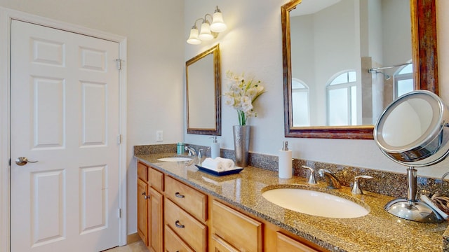 1942 NE 6th St, Deerfield Beach, FL 33441 - bathroom featuring double vanity and a sink