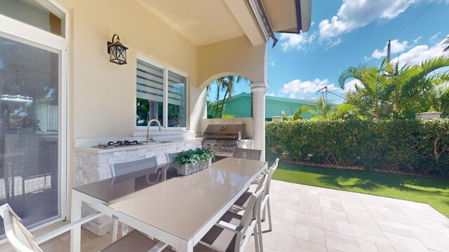 1942 NE 6th St, Deerfield Beach, FL 33441 - view of patio / terrace featuring area for grilling, an outdoor kitchen, a sink, and outdoor dining area