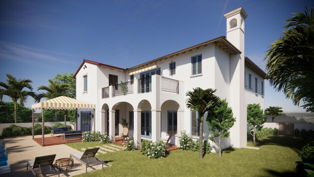 back of property featuring stucco siding, a chimney, a patio area, and a balcony