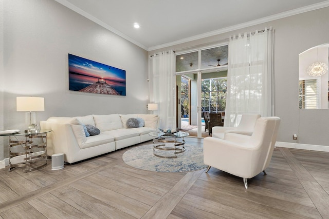 149 Sedona Way, Palm Beach Gardens, FL 33418 - living room with ornamental molding, baseboards, and healthy amount of natural light