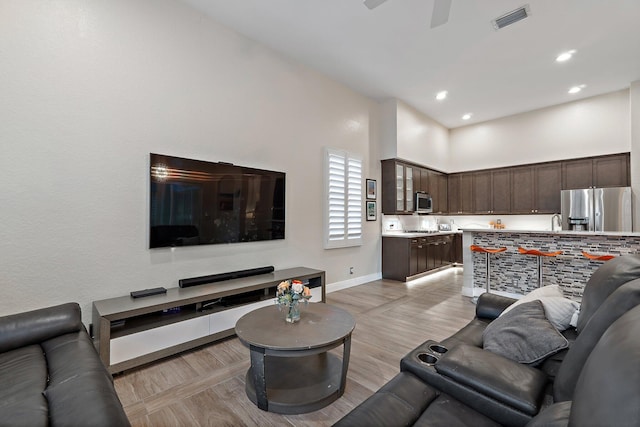 149 Sedona Way, Palm Beach Gardens, FL 33418 - living room featuring baseboards, a ceiling fan, recessed lighting, and light wood-type flooring