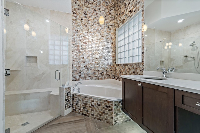 149 Sedona Way, Palm Beach Gardens, FL 33418 - bathroom featuring vanity, a garden tub, and a stall shower