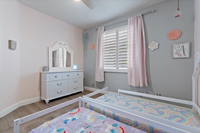 149 Sedona Way, Palm Beach Gardens, FL 33418 - bedroom with wood finished floors, baseboards, and ceiling fan