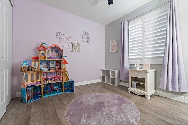 149 Sedona Way, Palm Beach Gardens, FL 33418 - game room featuring baseboards, wood finished floors, and ceiling fan