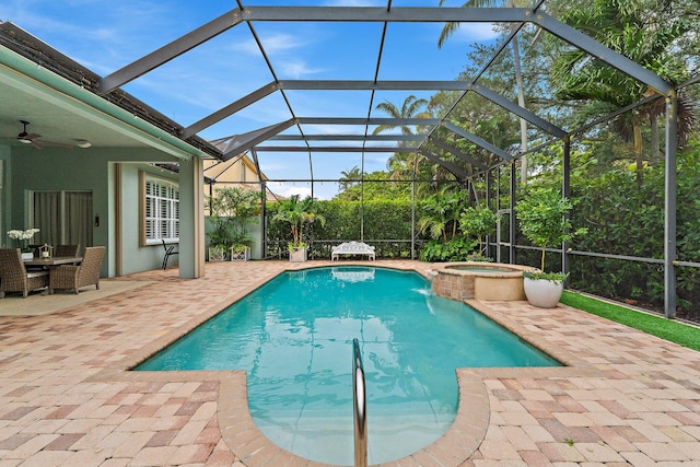 149 Sedona Way, Palm Beach Gardens, FL 33418 - view of pool featuring a patio, ceiling fan, a pool with connected hot tub, and a lanai