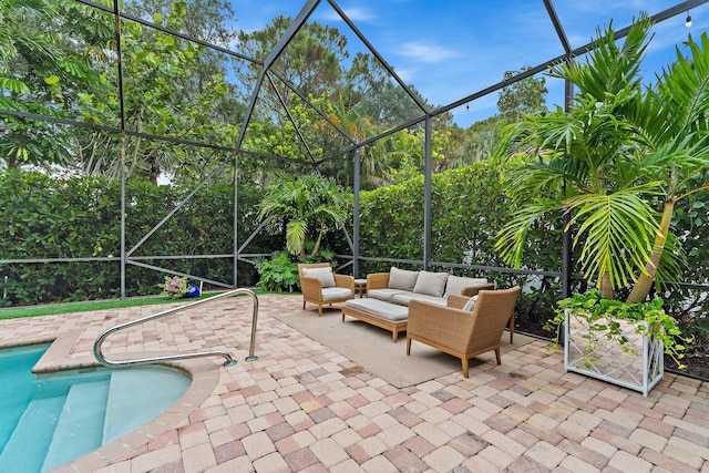 149 Sedona Way, Palm Beach Gardens, FL 33418 - swimming pool featuring an outdoor hangout area, a patio area, and a lanai