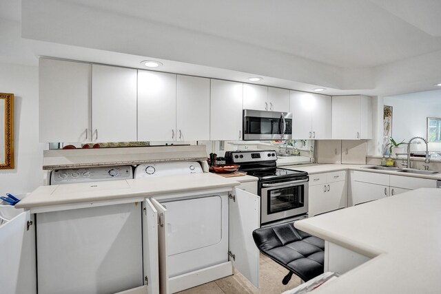155 Isle Of Venice Dr Unit 304, Fort Lauderdale, FL 33301 - kitchen with open floor plan, a sink, dishwasher, light countertops, and recessed lighting