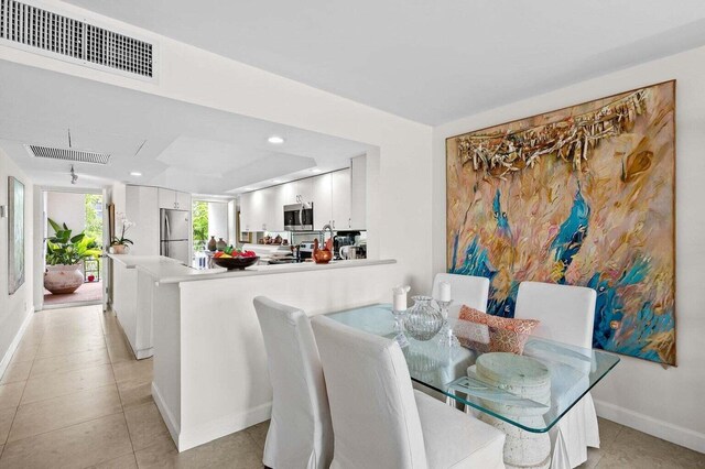 155 Isle Of Venice Dr Unit 304, Fort Lauderdale, FL 33301 - living room featuring baseboards and light tile patterned floors