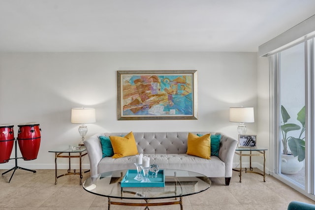 155 Isle Of Venice Dr Unit 304, Fort Lauderdale, FL 33301 - living area featuring baseboards and tile patterned flooring