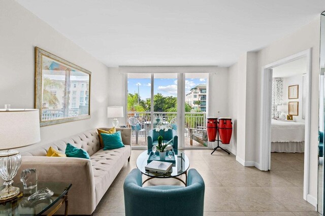 155 Isle Of Venice Dr Unit 304, Fort Lauderdale, FL 33301 - tiled living area with baseboards