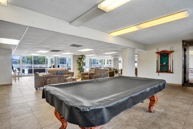 155 Isle Of Venice Dr Unit 304, Fort Lauderdale, FL 33301 - tiled living area with a drop ceiling