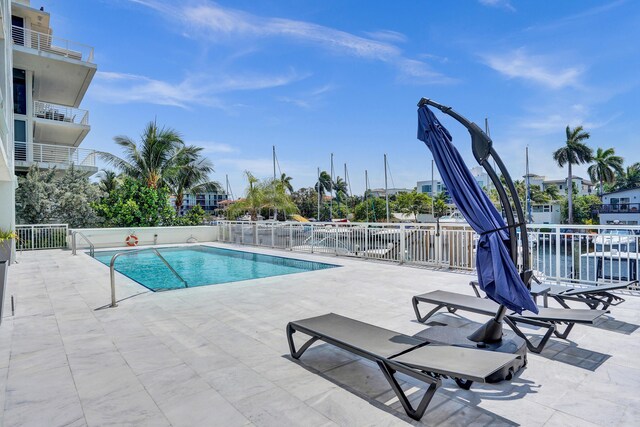 155 Isle Of Venice Dr Unit 304, Fort Lauderdale, FL 33301 - game room featuring a textured ceiling