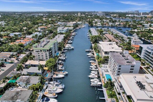 155 Isle Of Venice Dr Unit 304, Fort Lauderdale, FL 33301 - bird's eye view of numerous boat docks, a nearby body of water, and a skyline view
