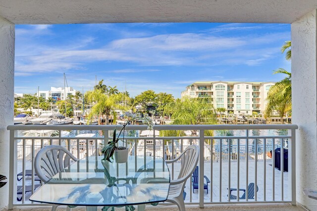 155 Isle Of Venice Dr Unit 304, Fort Lauderdale, FL 33301 - full bath featuring tile walls, a stall shower, toilet, and vanity