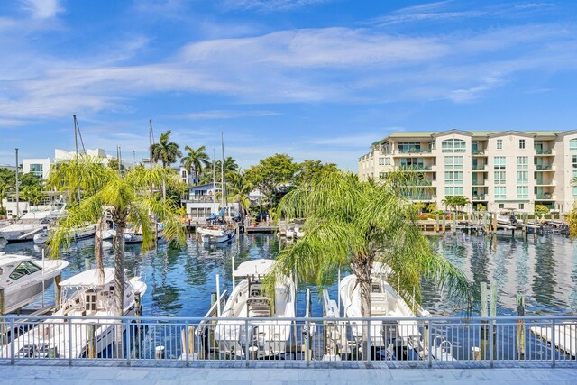 155 Isle Of Venice Dr Unit 304, Fort Lauderdale, FL 33301 - view of patio / terrace featuring a water view and fence