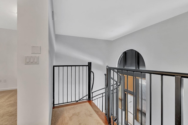 801 S Olive Ave Unit 127, West Palm Beach, FL 33401 - corridor with an upstairs landing, carpet, and baseboards