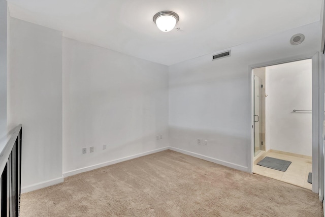 801 S Olive Ave Unit 127, West Palm Beach, FL 33401 - unfurnished bedroom featuring carpet flooring, visible vents, and baseboards