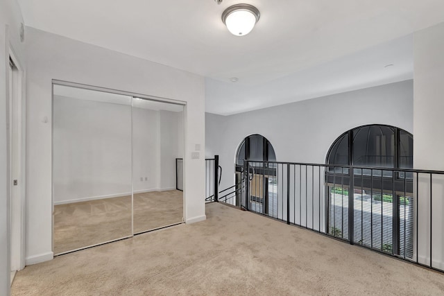 801 S Olive Ave Unit 127, West Palm Beach, FL 33401 - interior space with a closet, carpet flooring, and baseboards