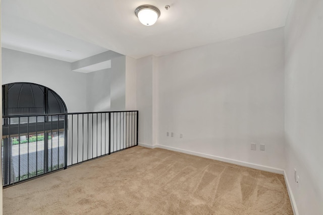 801 S Olive Ave Unit 127, West Palm Beach, FL 33401 - unfurnished room featuring carpet and baseboards