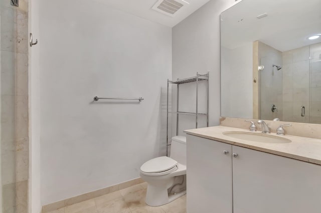 801 S Olive Ave Unit 127, West Palm Beach, FL 33401 - bathroom with a shower stall, vanity, toilet, visible vents, and baseboards