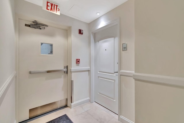 801 S Olive Ave Unit 127, West Palm Beach, FL 33401 - doorway featuring light tile patterned flooring