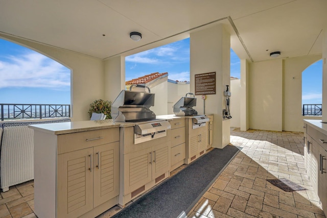 801 S Olive Ave Unit 127, West Palm Beach, FL 33401 - view of patio featuring exterior kitchen and grilling area