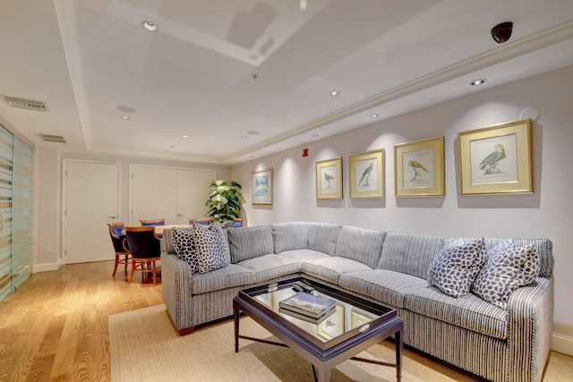801 S Olive Ave Unit 127, West Palm Beach, FL 33401 - living area featuring recessed lighting, visible vents, light wood-style flooring, and a tray ceiling
