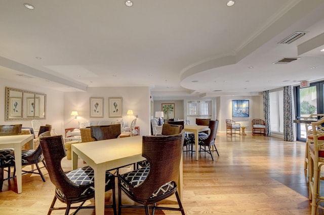 801 S Olive Ave Unit 127, West Palm Beach, FL 33401 - dining area with visible vents, light wood finished floors, and recessed lighting