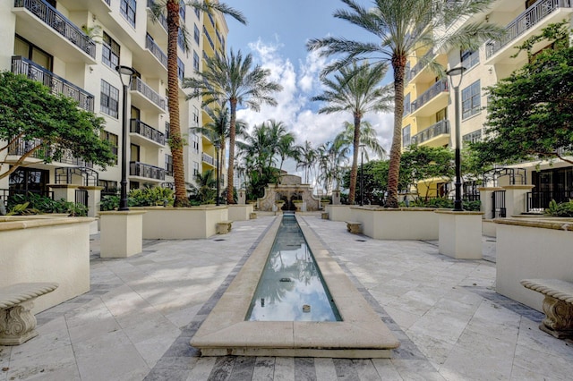 801 S Olive Ave Unit 127, West Palm Beach, FL 33401 - view of community with a patio area