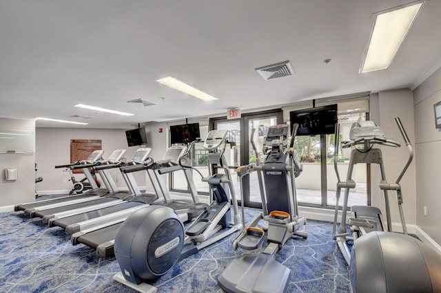 801 S Olive Ave Unit 127, West Palm Beach, FL 33401 - workout area with baseboards, visible vents, and carpet flooring