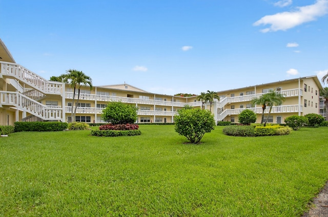 63 Dorset Unit B, Boca Raton, FL 33434 - view of property's community with a yard