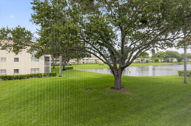 63 Dorset Unit B, Boca Raton, FL 33434 - view of grassy yard with a water view