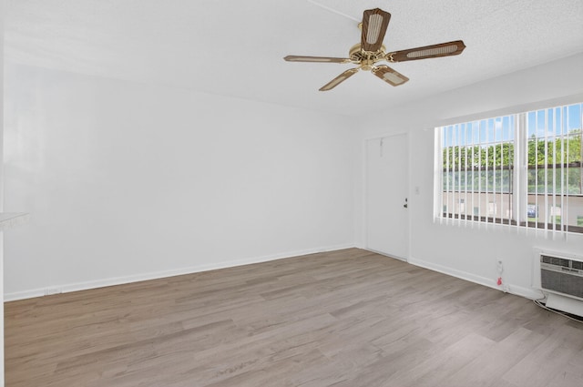 63 Dorset Unit B, Boca Raton, FL 33434 - empty room with light wood-style floors and ceiling fan
