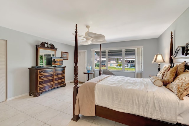 1245 High Point Pl S Unit C, Delray Beach, FL 33445 - bedroom featuring baseboards, ceiling fan, and light tile patterned floors