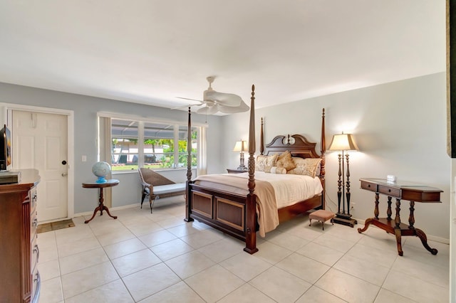 1245 High Point Pl S Unit C, Delray Beach, FL 33445 - bedroom with light tile patterned floors, baseboards, and a ceiling fan