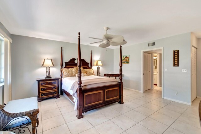 1245 High Point Pl S Unit C, Delray Beach, FL 33445 - bedroom featuring light tile patterned floors, baseboards, a ceiling fan, and visible vents
