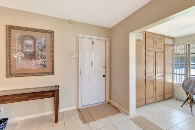 1245 High Point Pl S Unit C, Delray Beach, FL 33445 - foyer entrance with light tile patterned flooring and baseboards