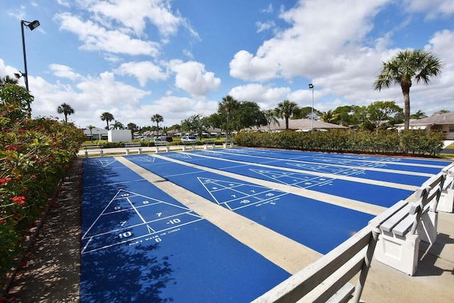 1245 High Point Pl S Unit C, Delray Beach, FL 33445 - view of property's community featuring shuffleboard and uncovered parking