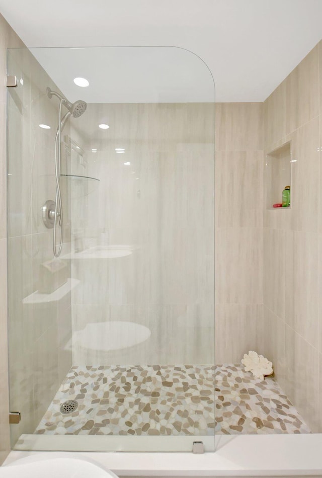bathroom featuring a stall shower
