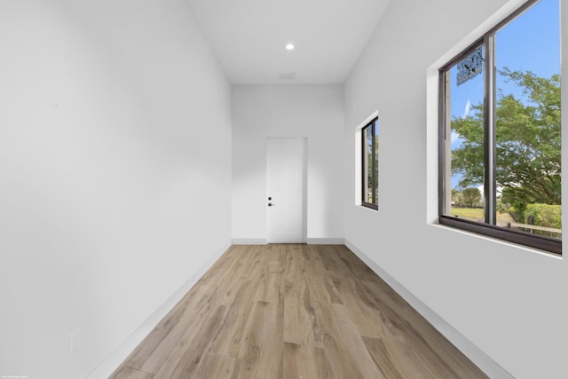 TBD 125th Ave S, Wellington, FL 33414 - unfurnished room with baseboards, light wood finished floors, and recessed lighting