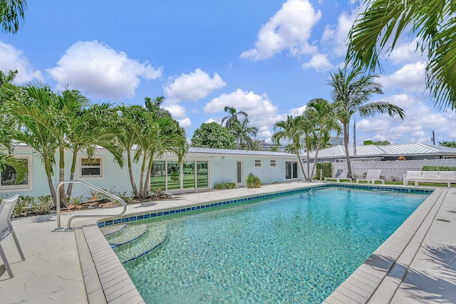 2780 NE 5th St, Pompano Beach, FL 33062 - view of pool with a fenced in pool, fence, and a patio