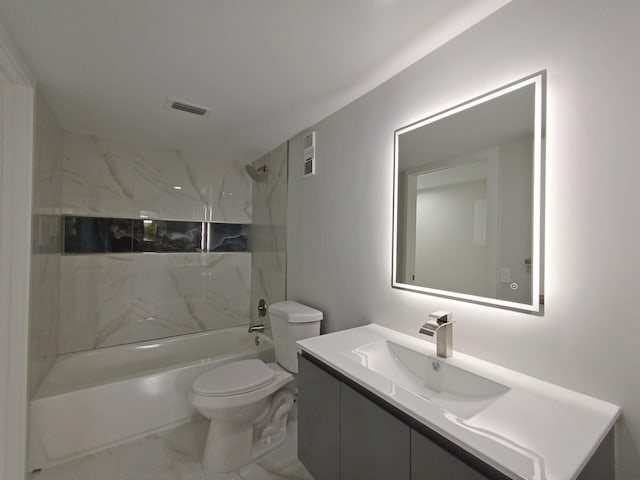 bathroom featuring bathing tub / shower combination, toilet, visible vents, marble finish floor, and vanity