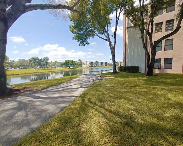 7320 Amberly Ln Unit 305, Delray Beach, FL 33446 - view of property's community with a water view and a yard
